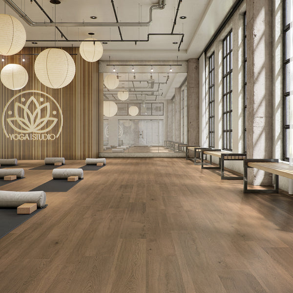 Daltile room scene: Asher Bend Lodge 9x71 plank installed in a commercial studio