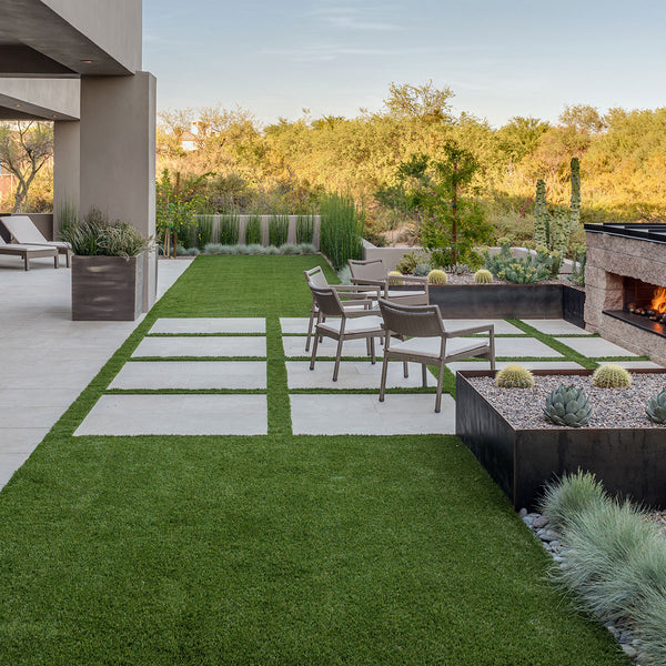 Evergrass Emerald precut turf installed between pavers (image: MSI)