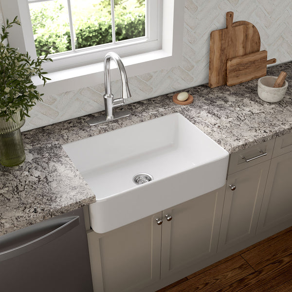 MSI Fireclay Farmhouse Single Bowl Sink in White, installed in a room setting