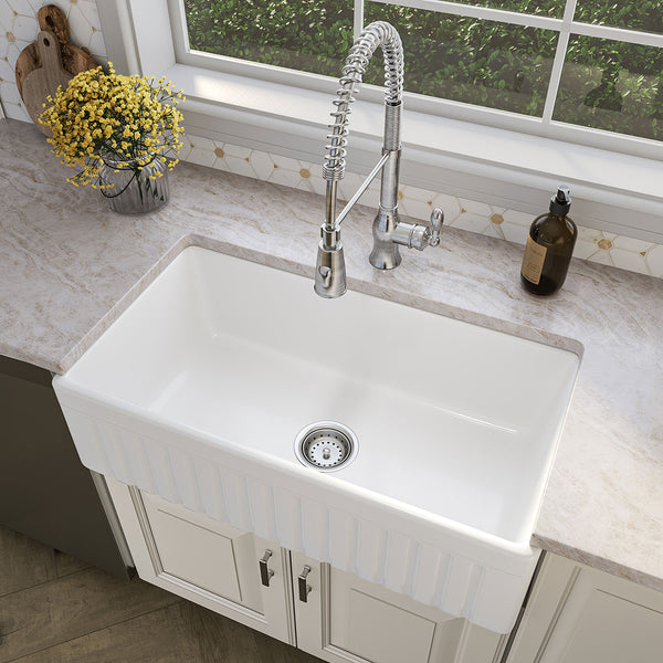 MSI Fireclay Farmhouse Single Bowl Sink in White, installed in a room setting