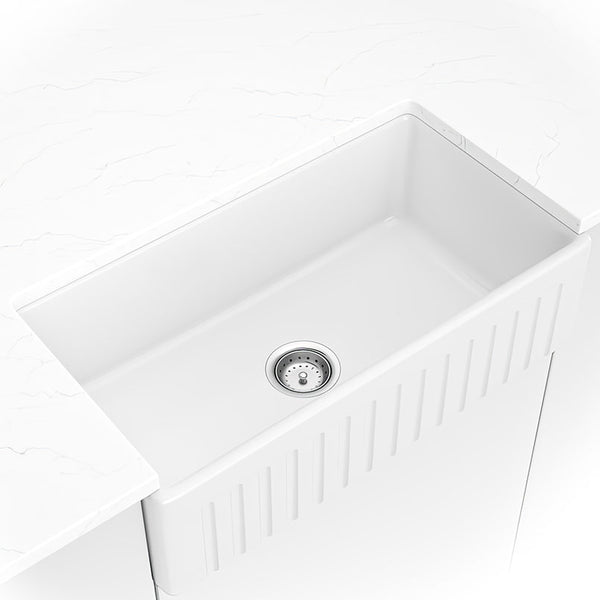 MSI Fireclay Farmhouse Single Bowl Sink in White, installed in a room setting