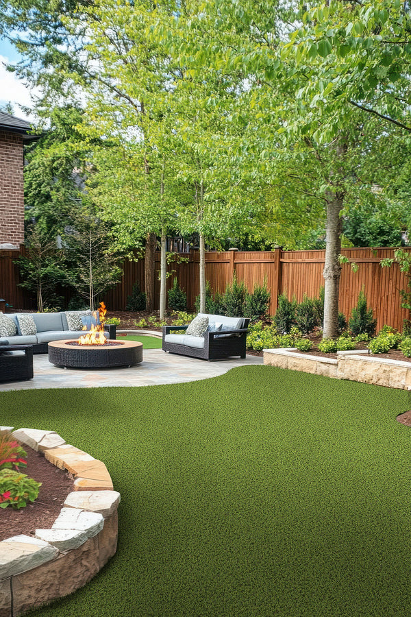 Evergrass Viridian Pet Turf 96 oz, installed in a backyard with patio seating (image: MSI) | SKU LTRFRVIR15X100-30MM96OZ-PET