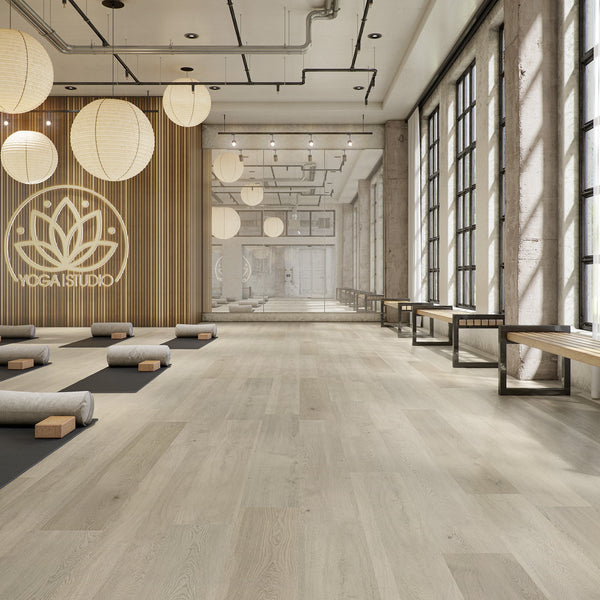 Daltile room scene: Asher Bend Villa 9x71 plank installed in a commercial studio