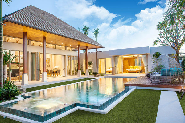 Evergrass Emerald Green Turf 110 oz, installed beside a pool and pool house (image: MSI) | SKU LTRFREME15X100-45MM110OZ