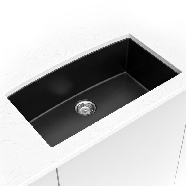 MSI Quartz Composite Undermount Single Bowl Sink in Black, installed in a room setting