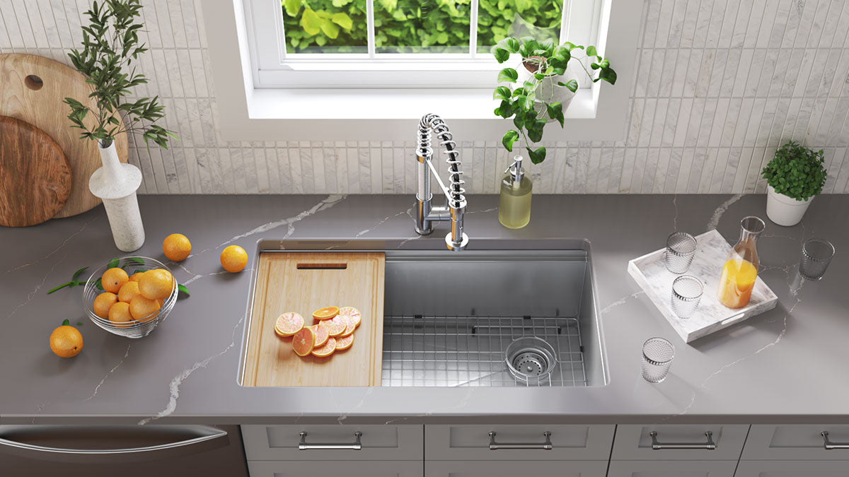 Stainless 16 gauge handcrafted workstation single bowl sink 3319, installed in a kitchen with cutting board and grid (image: MSI)
